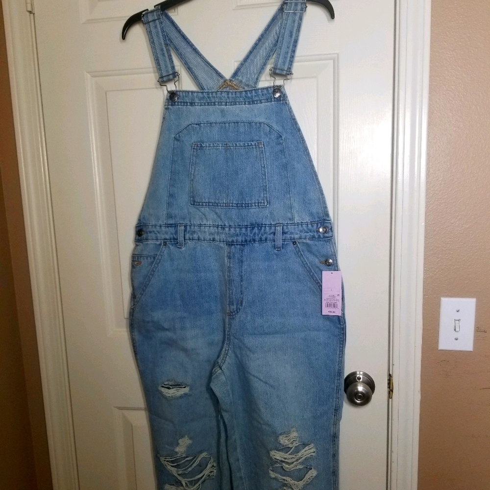 Oversized distressed overalls